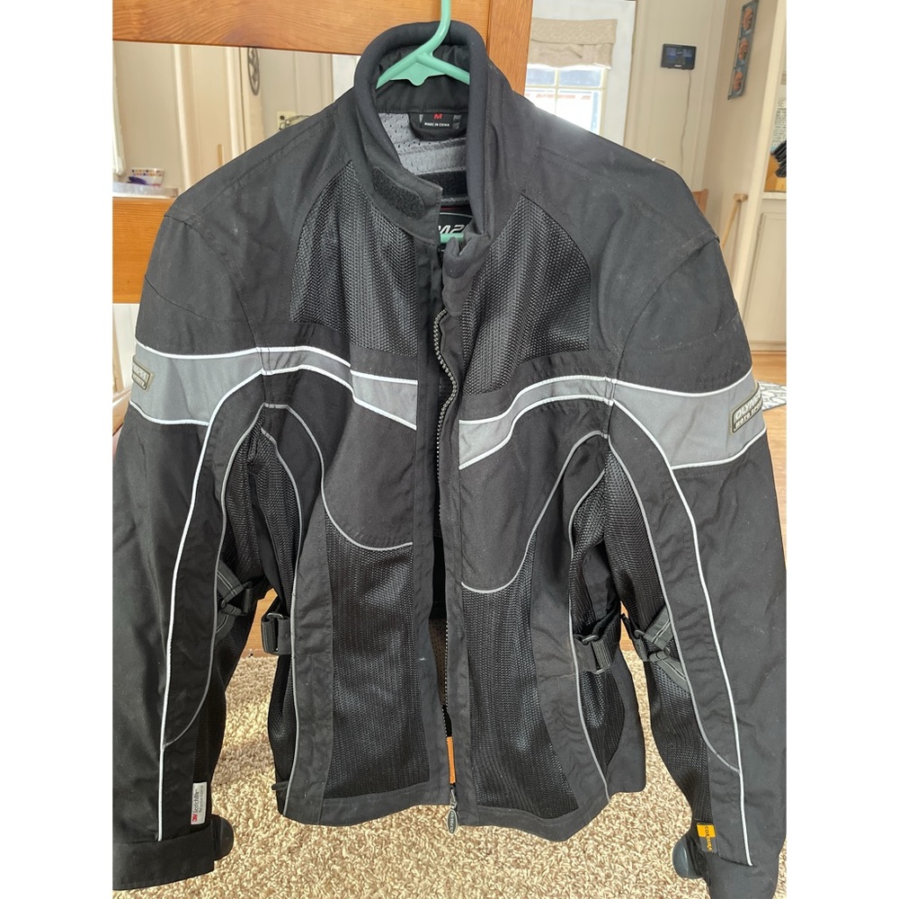 Olympia women’s medium black with grey accents and reflective trim.